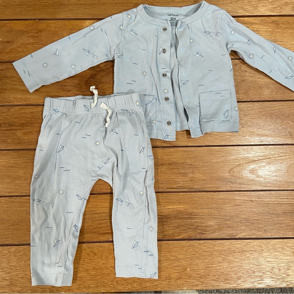 Carter’s light blue paper airplane and sunshine pants and button top set 9-12M